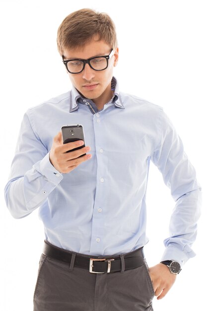 Man in glasses holding a phone