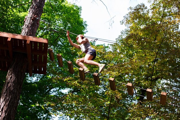 Man goes up on the rope ladder