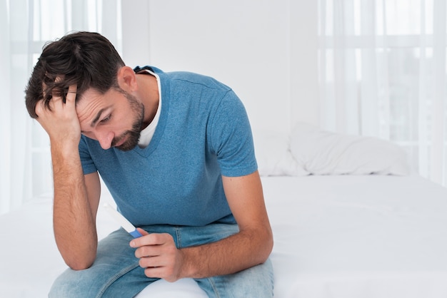 Man not happy about pregnancy test result