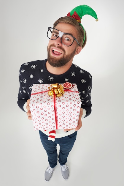 Man happy to give this big present
