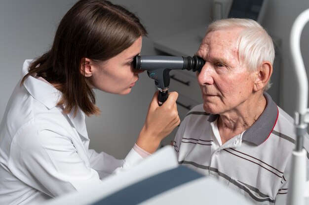 Free photo man having an eye sight check