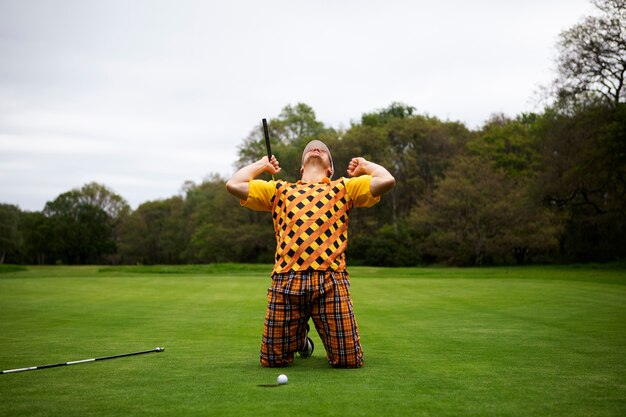 Man having a game of golf outdoors