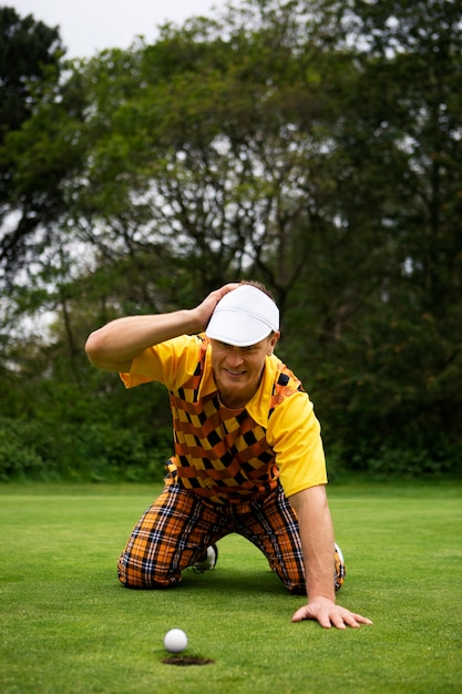 Man having a game of golf outdoors