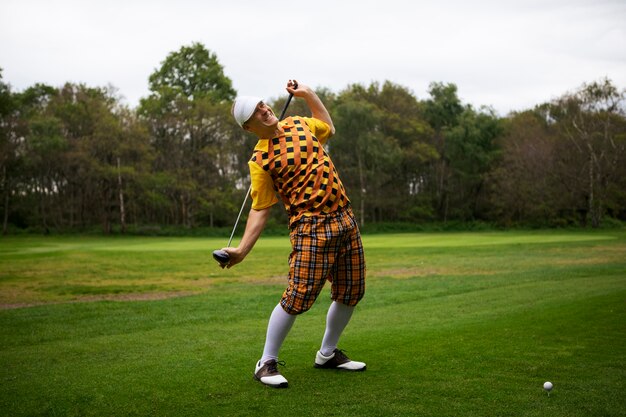 Man having a game of golf outdoors