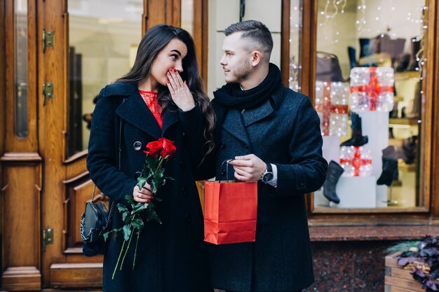 Man having gift for beautiful girlfriend