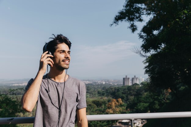 Man in headphones in park