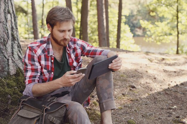 man hiking in forest