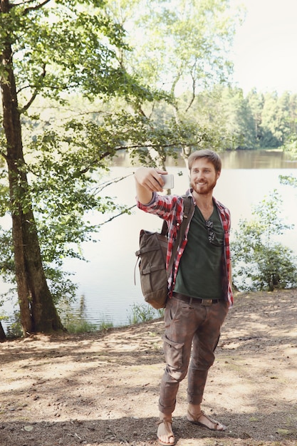 man hiking in forest