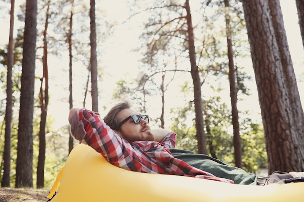 man hiking in forest