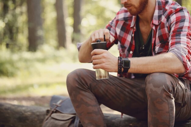 man hiking in forest