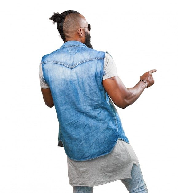 Man on his back in a denim jacket