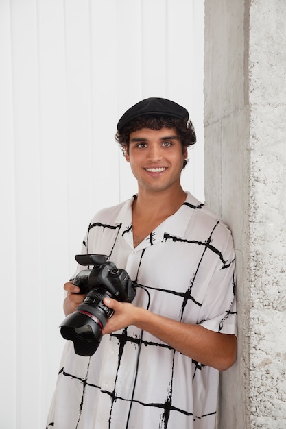 Free photo man in his professional photography studio