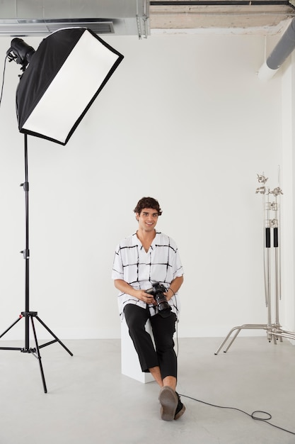 Man in his professional photography studio