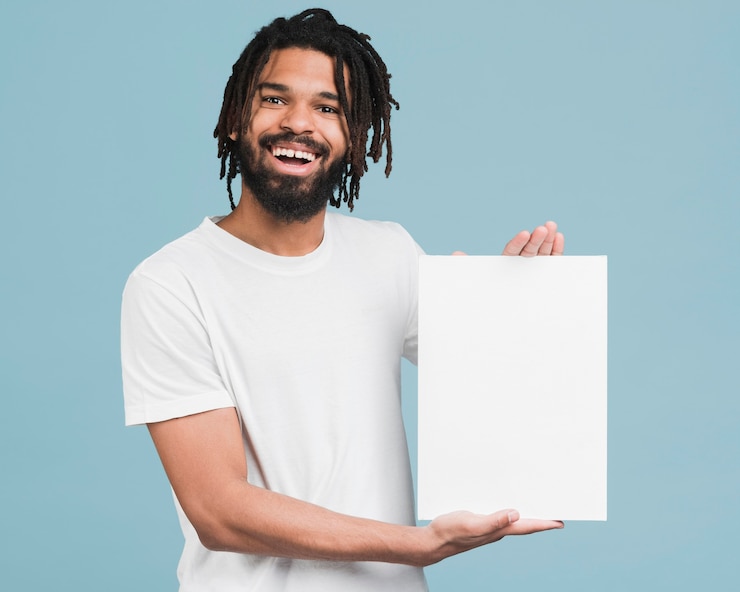 Free Photo man holding a blank sign