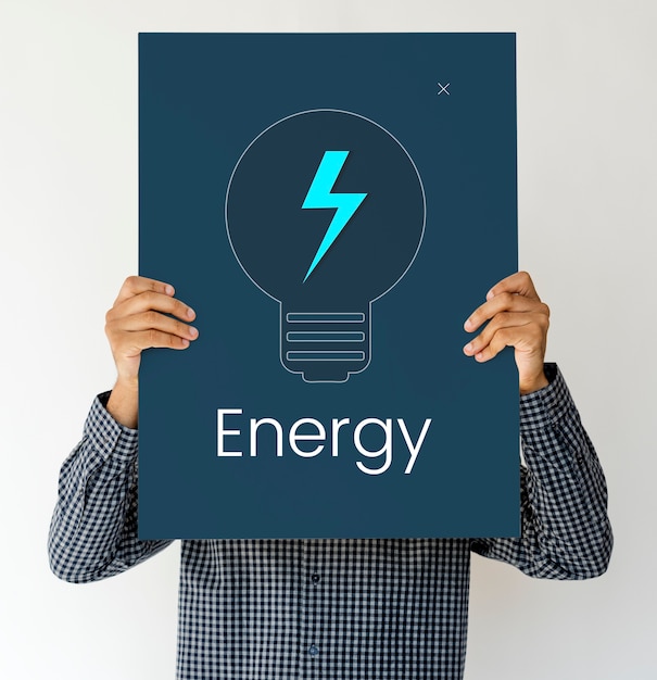 Free photo man holding a board with energy concept