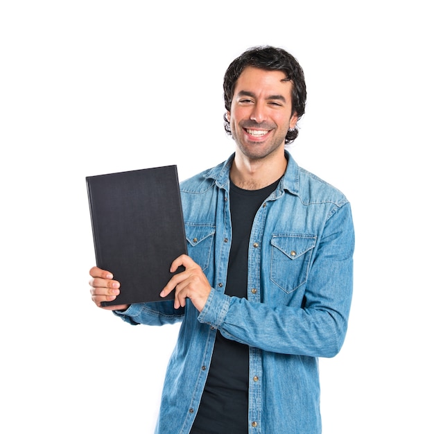 Man holding a book over white background