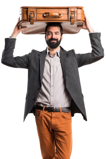 Free photo man holding a briefcase