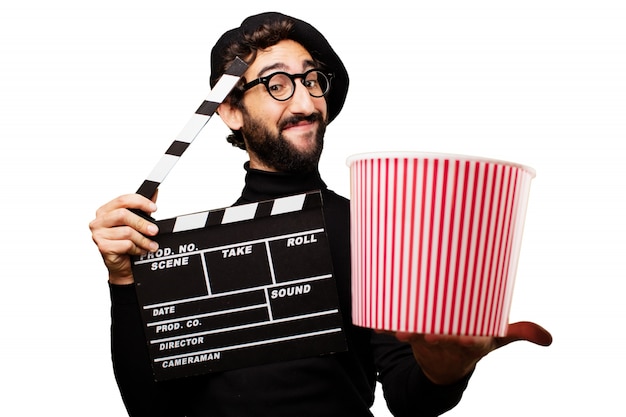 Man holding a clapper and popcorn