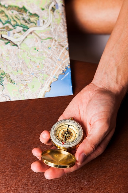 Man holding compass