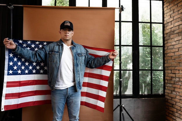 Free photo man holding flag medium shot