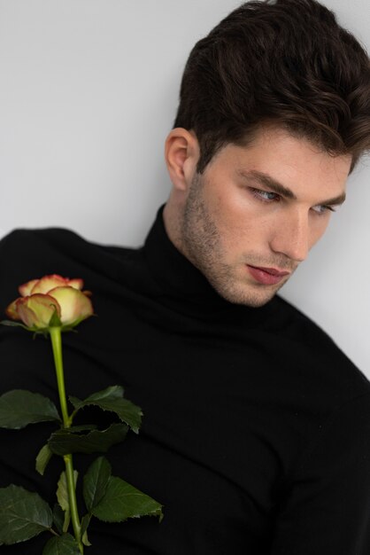 Man holding flower front view