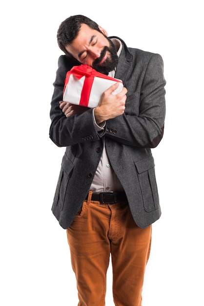 Free photo man holding a gift