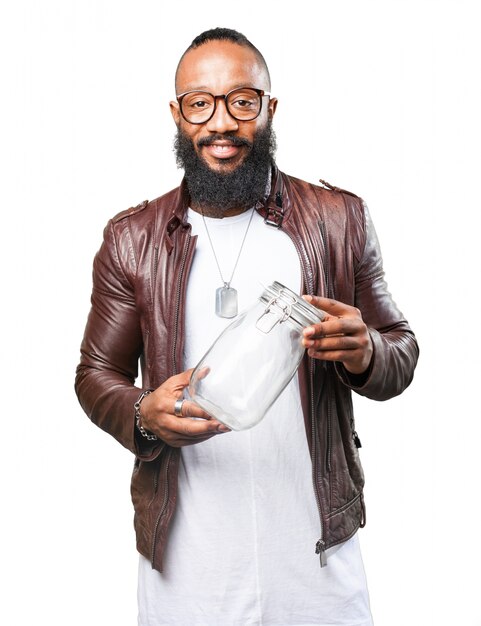 Man holding a glass jar