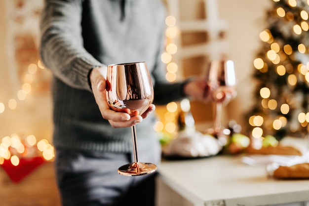 Man holding glasses and celebrating