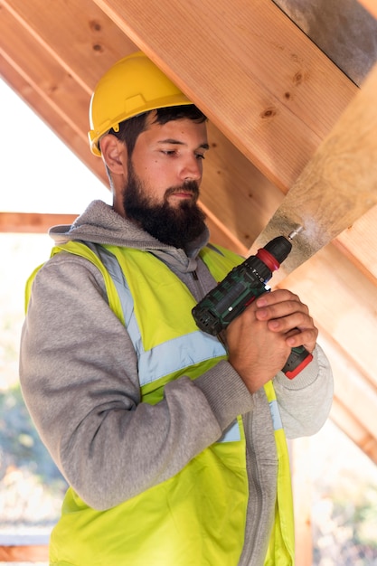 Man holding a hammer drill