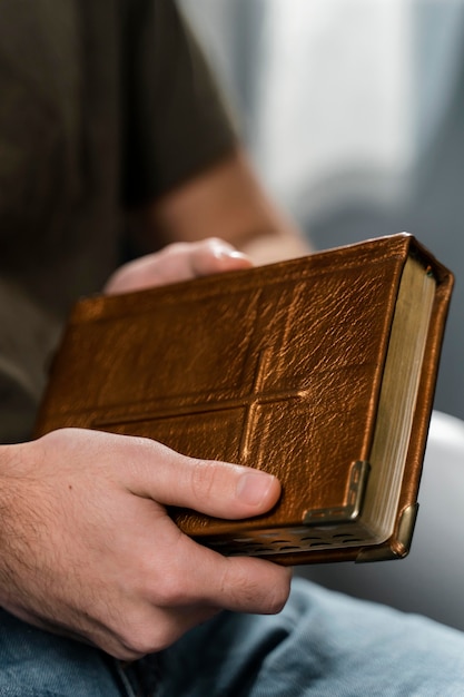 Man holding holy book