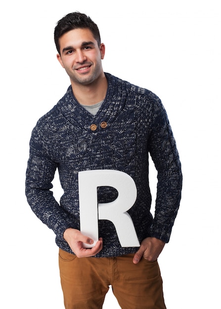 Man holding the letter "r"