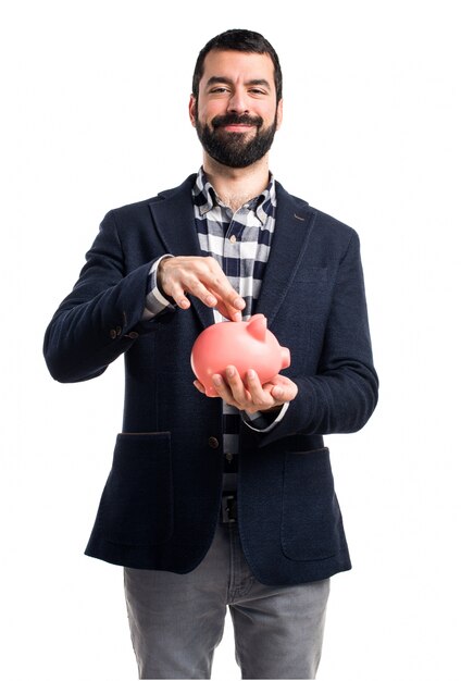 Man holding a piggybank