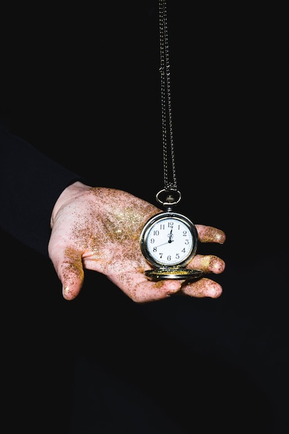 Man holding pocket watch 