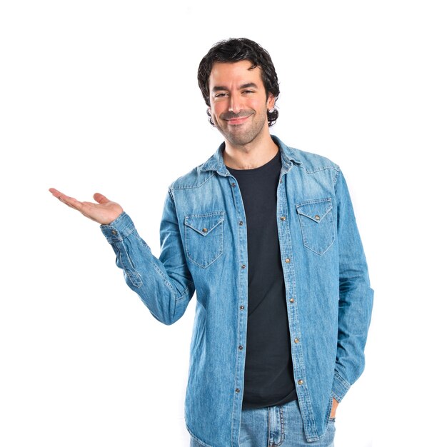 Man holding something over white background