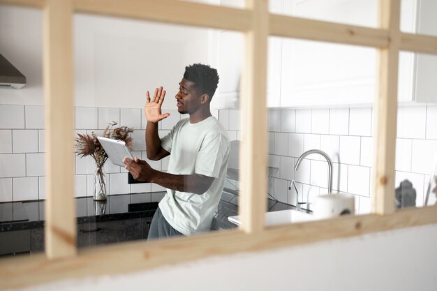 Man holding tablet medium shot