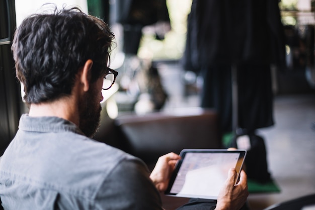 Man holding tablet