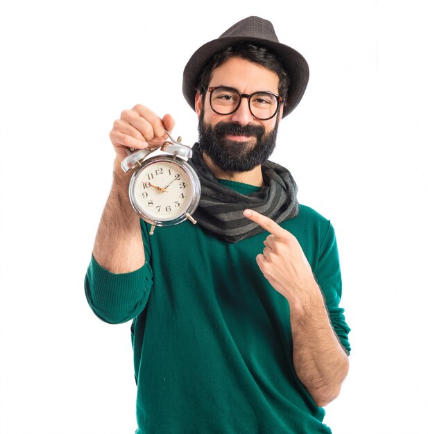 Man holding vintage clock