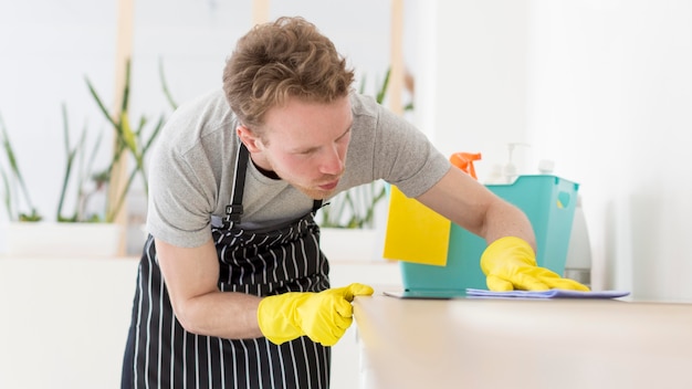 Man at home cleaning