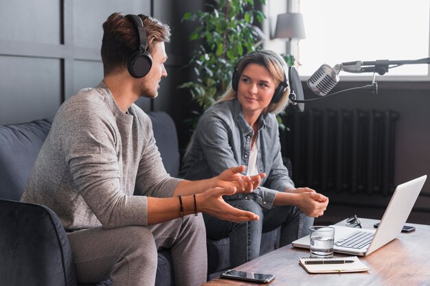 Man interviewing woman