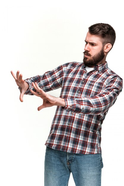 Man is looking scared. Over white background