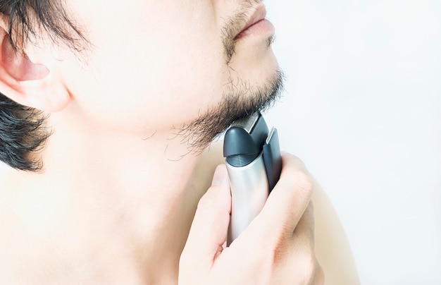 Man is using shaver