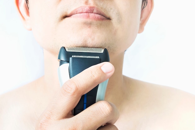 Man is using shaver