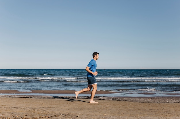 Man jogging at the beach