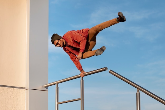 Man jumping while doing parkour