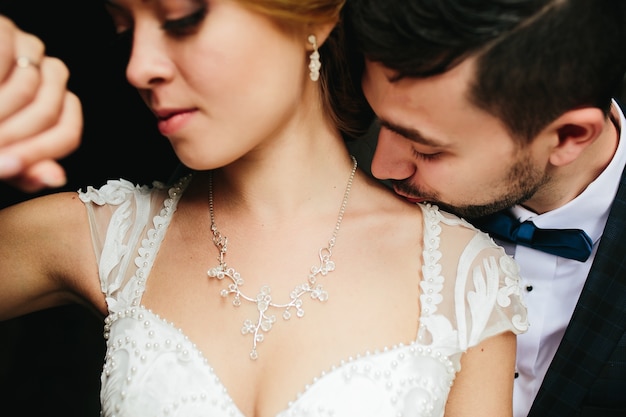 Man kissing his bride