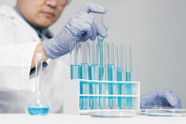 Man in lab doing experiments close up