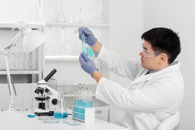 Man in lab doing experiments