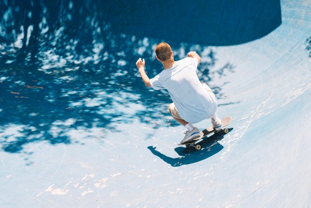 Man landing on skateboard