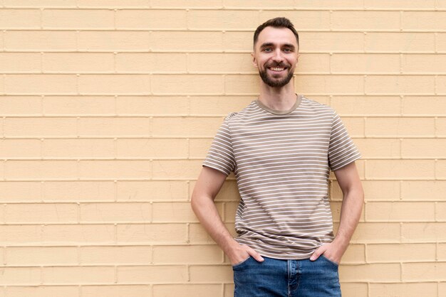 Man leaning on a wall