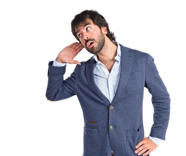 Man listening over isolated white background